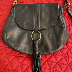 Lucky Brand black leather hobo bag flap closure